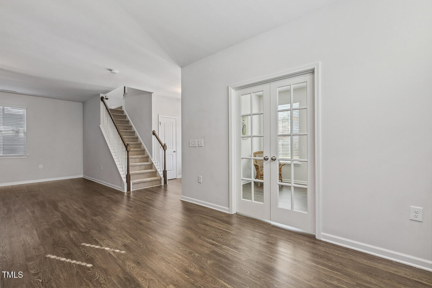 232 Big Barn Drive Wendell, NC 27591 - Photo 20 of 56 an empty room with wooden floor and entryway