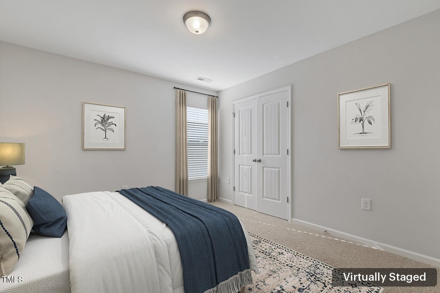 232 Big Barn Drive Wendell, NC 27591 - Photo 46 of 56 a bedroom with a bed and a window