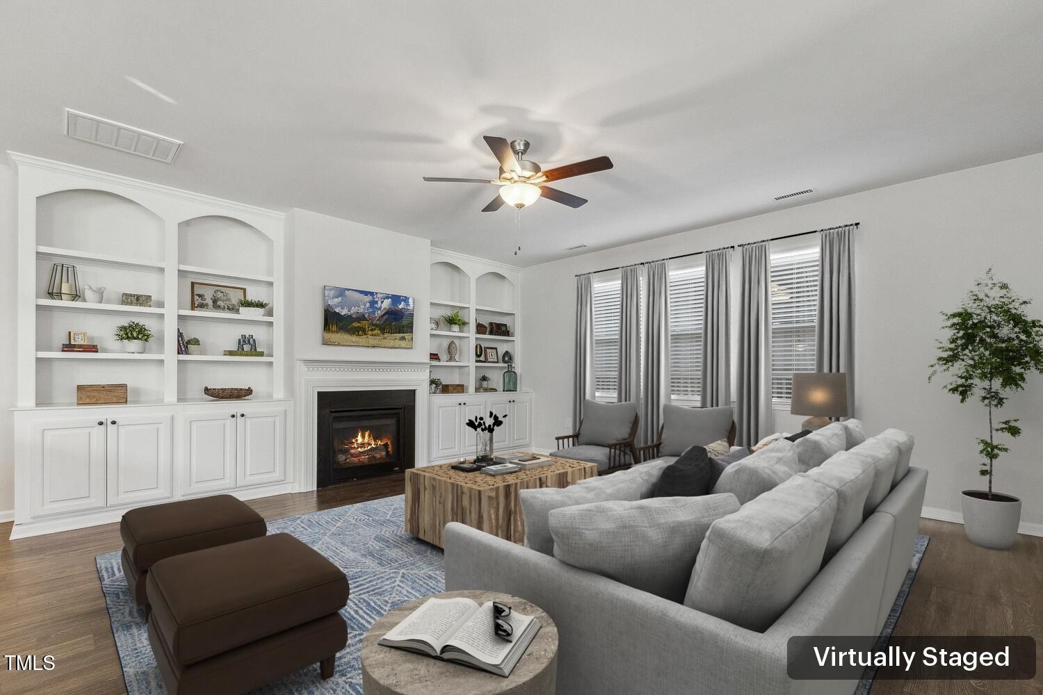 232 Big Barn Drive Wendell, NC 27591 - Photo 6 of 56 a living room with furniture fireplace and a large window