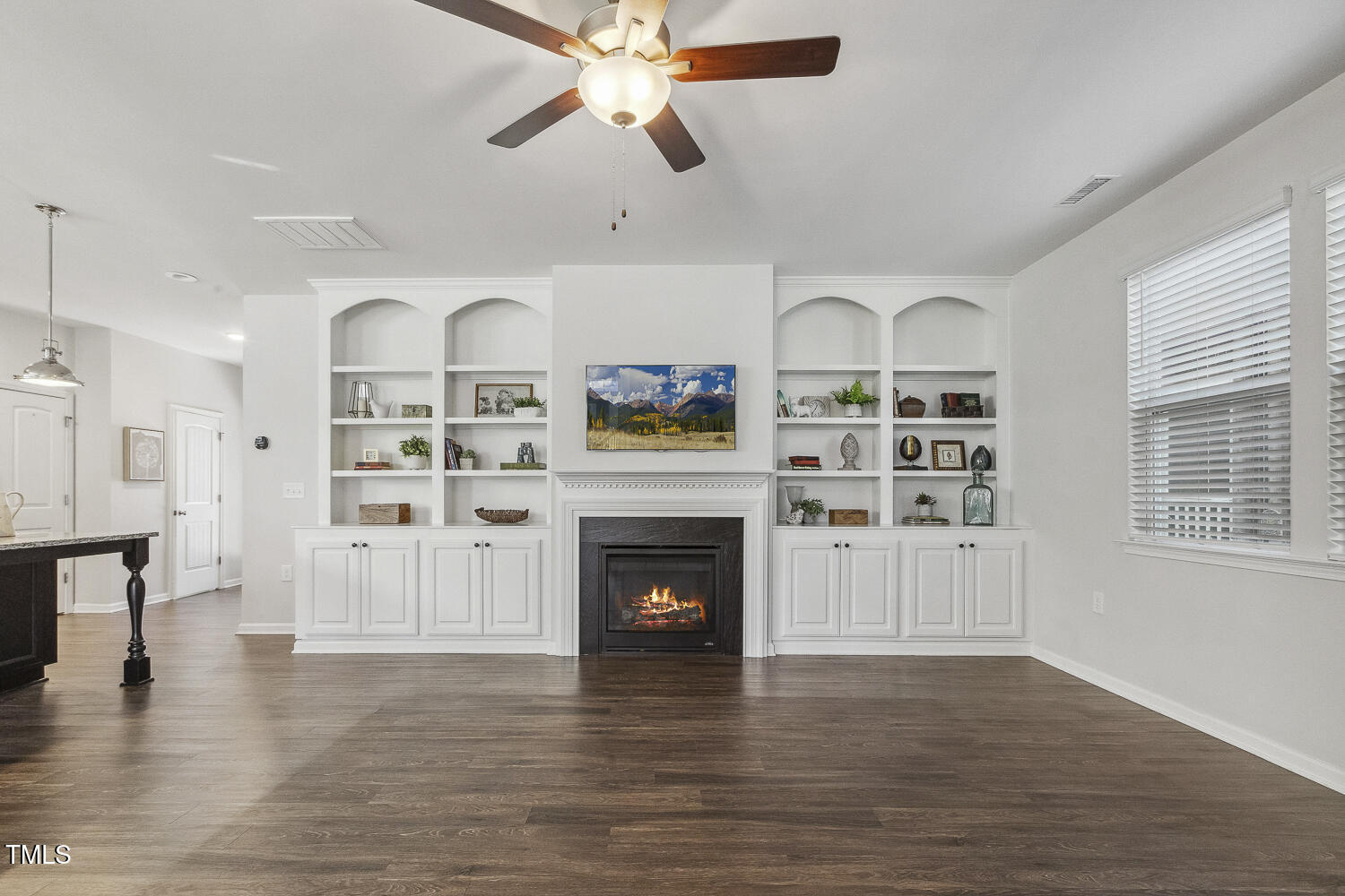 232 Big Barn Drive Wendell, NC 27591 - Photo 7 of 56 a living room with furniture fireplace and wooden floor