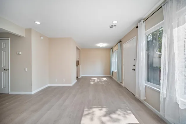 a view of entryway with wooden floor