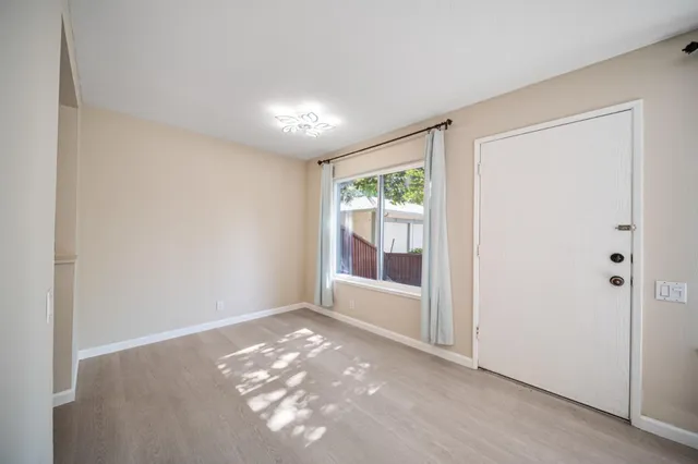 a bathroom with a sink vanity and mirror