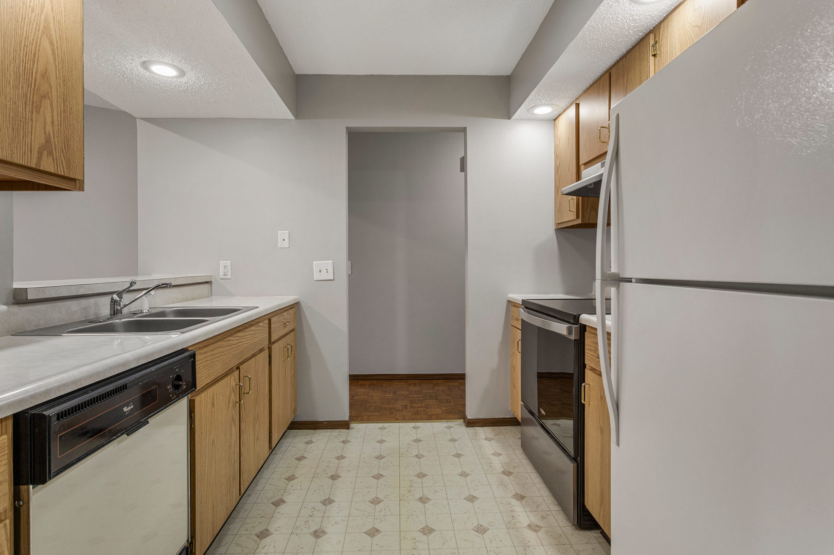 413 Irvine Road, Unit 413 Champaign, IL 61822 - Photo 11 of 29 a bathroom with a sink and a mirror