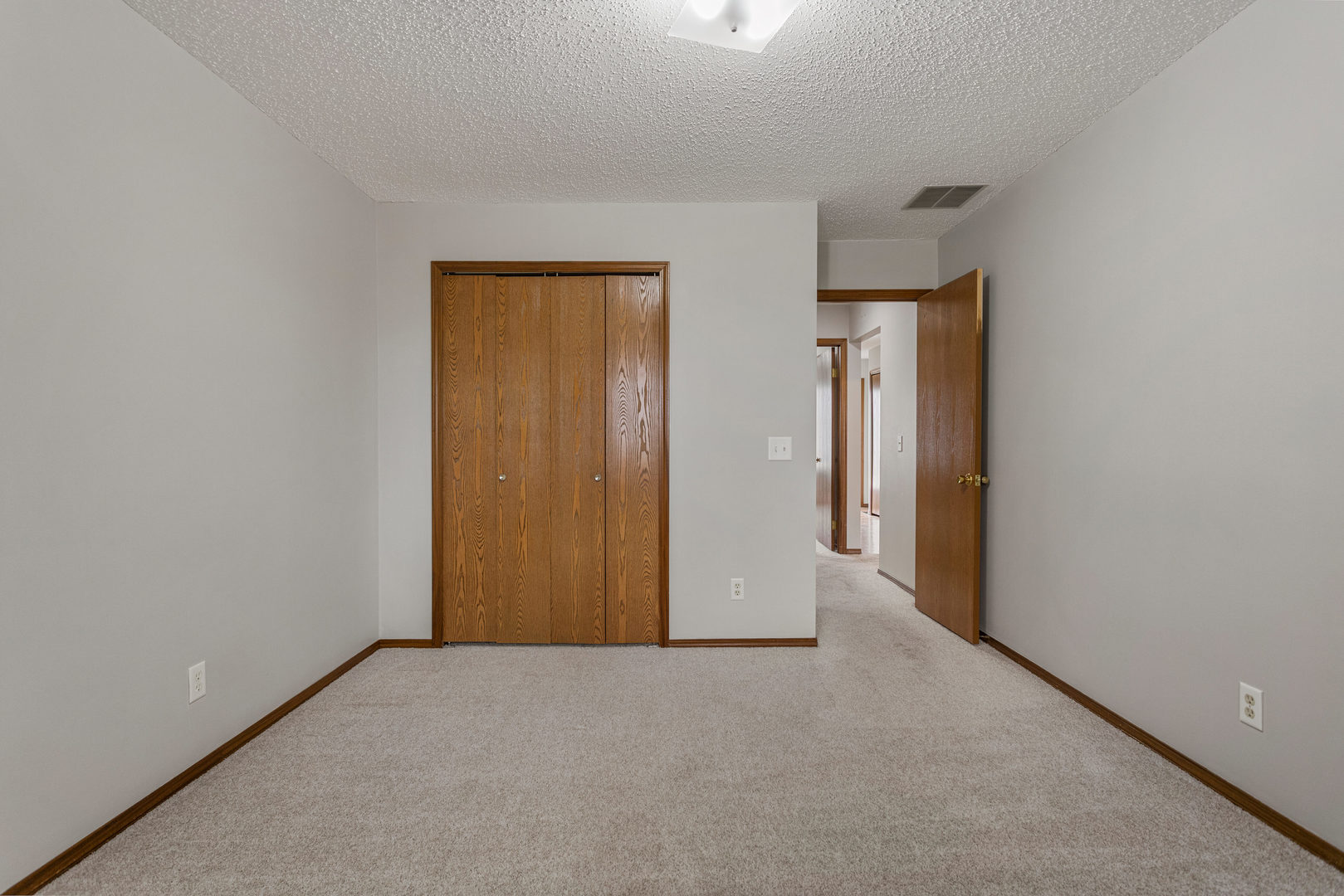 413 Irvine Road, Unit 413 Champaign, IL 61822 - Photo 15 of 29 a view of an empty room