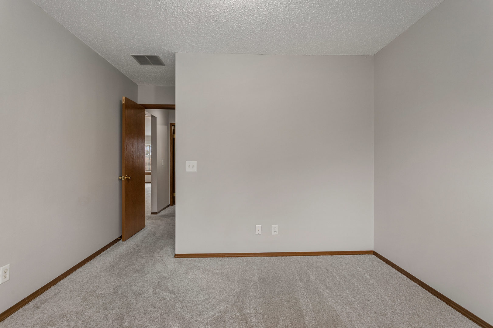 413 Irvine Road, Unit 413 Champaign, IL 61822 - Photo 18 of 29 a view of an empty room