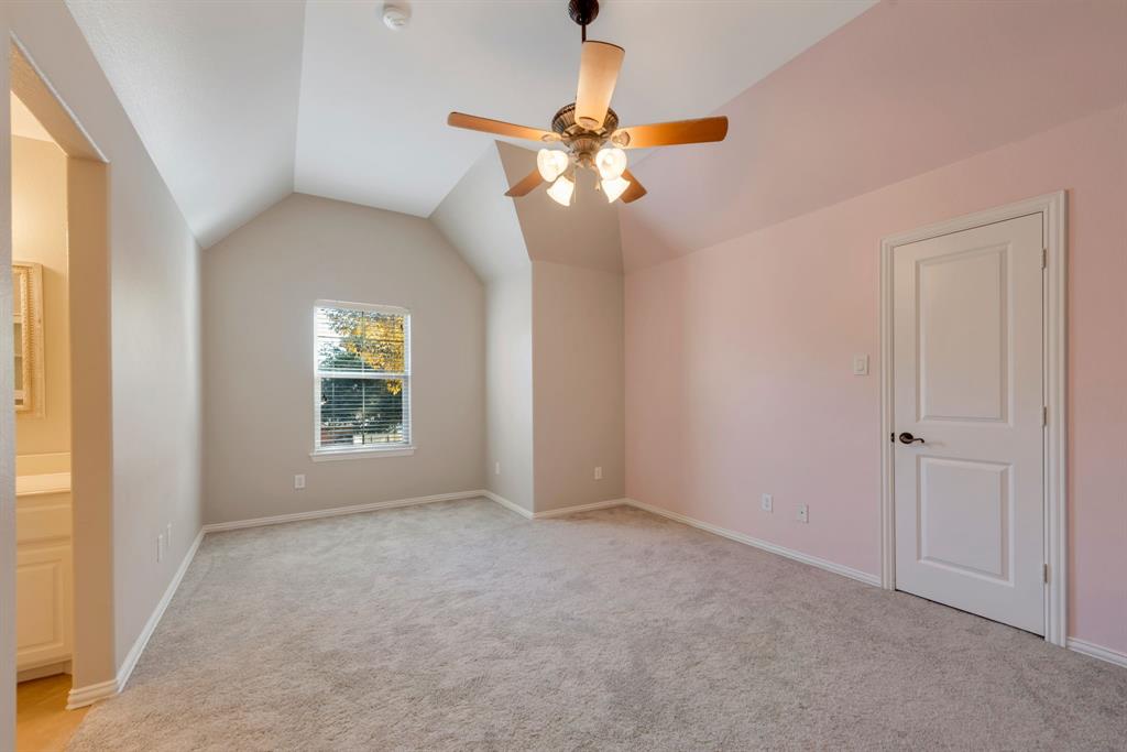 701 Buffalo Springs Drive Prosper, TX 75078 - Photo 8 of 15 a view of a livingroom with a ceiling fan and window