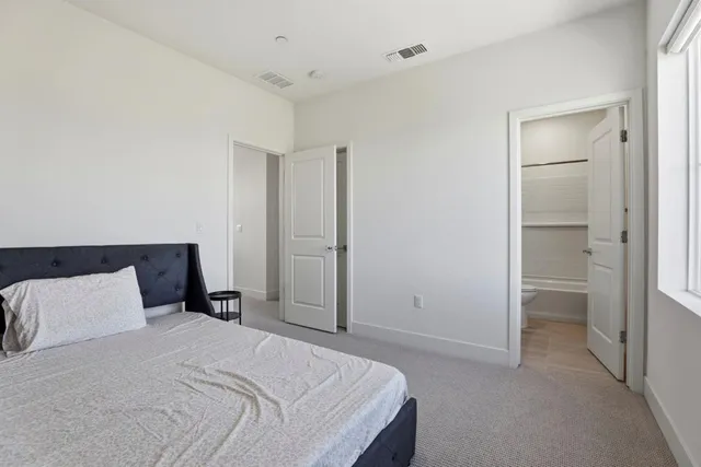 a view of a hallway with a white walls