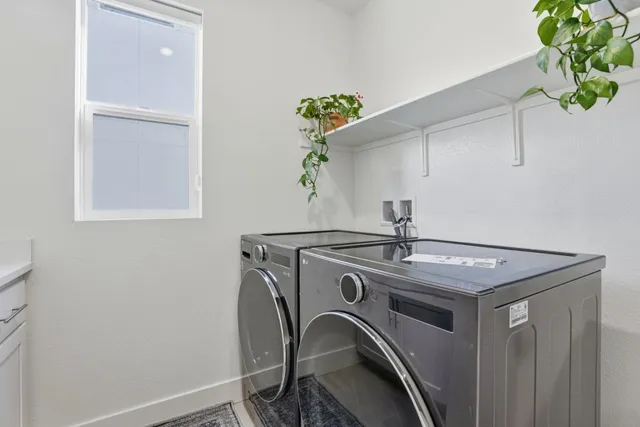 a view of entryway livingroom and hall