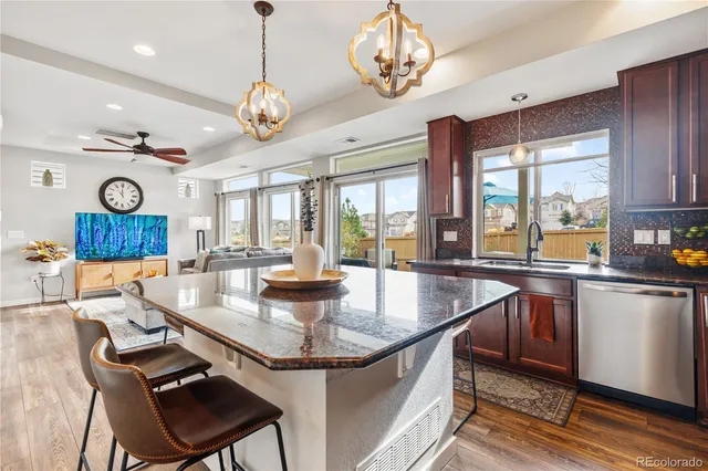 a very nice looking kitchen with a large window