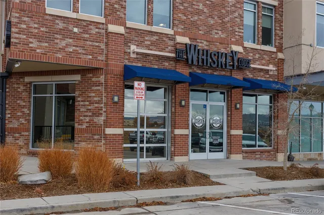 a view of brick building with a entrance