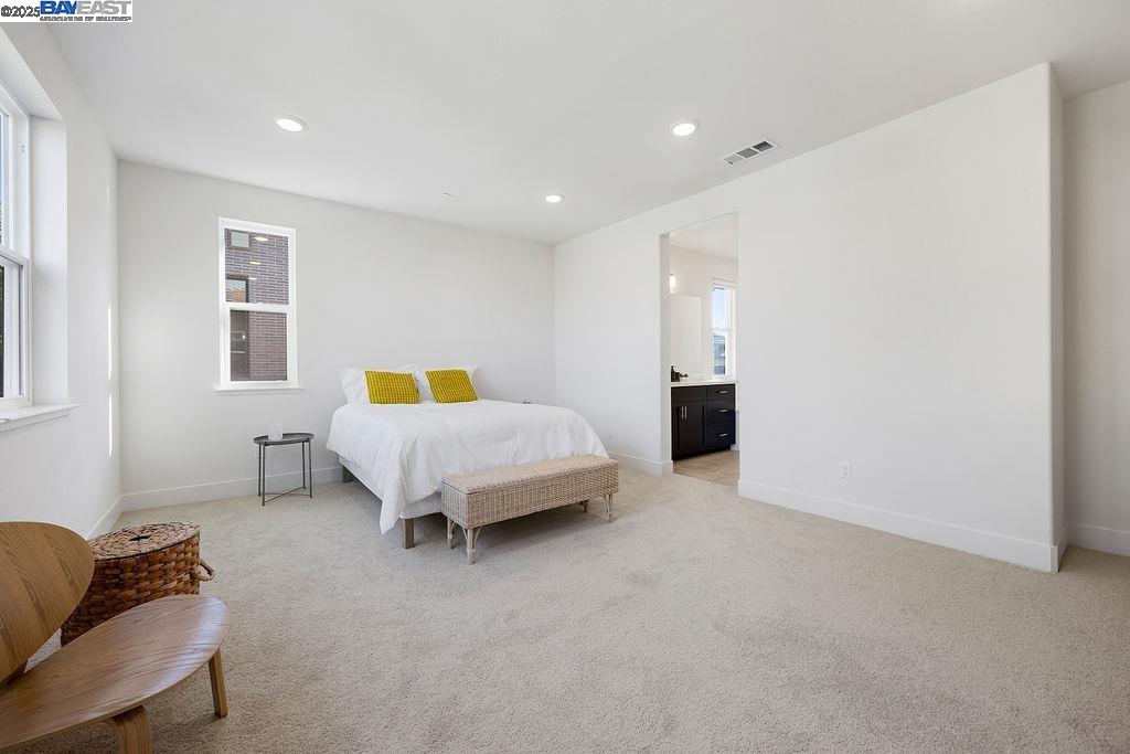 2729 Fifth Street Alameda, CA 94501 - Photo 11 of 19 a bedroom with a bed and couch