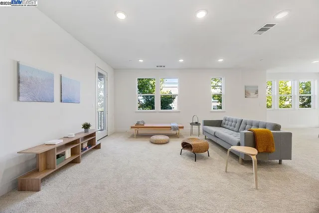 a room with furniture and a window