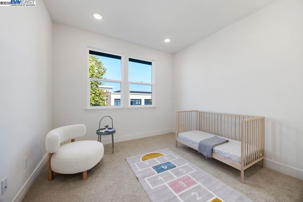2729 Fifth Street Alameda, CA 94501 - Photo 8 of 19 a bedroom with furniture and a window