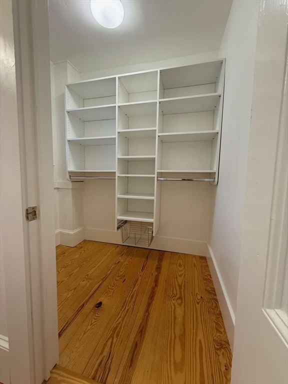 105 Elm Street, Unit A Andover, MA 01810 - Photo 24 of 40 a view of a room with empty racks