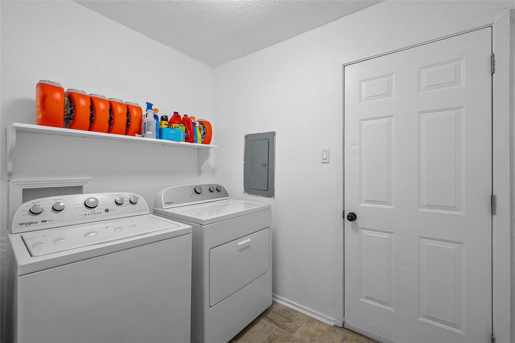 711 Rosedale Drive Hewitt, TX 76643 - Photo 8 of 16 a utility room with dryer and washer