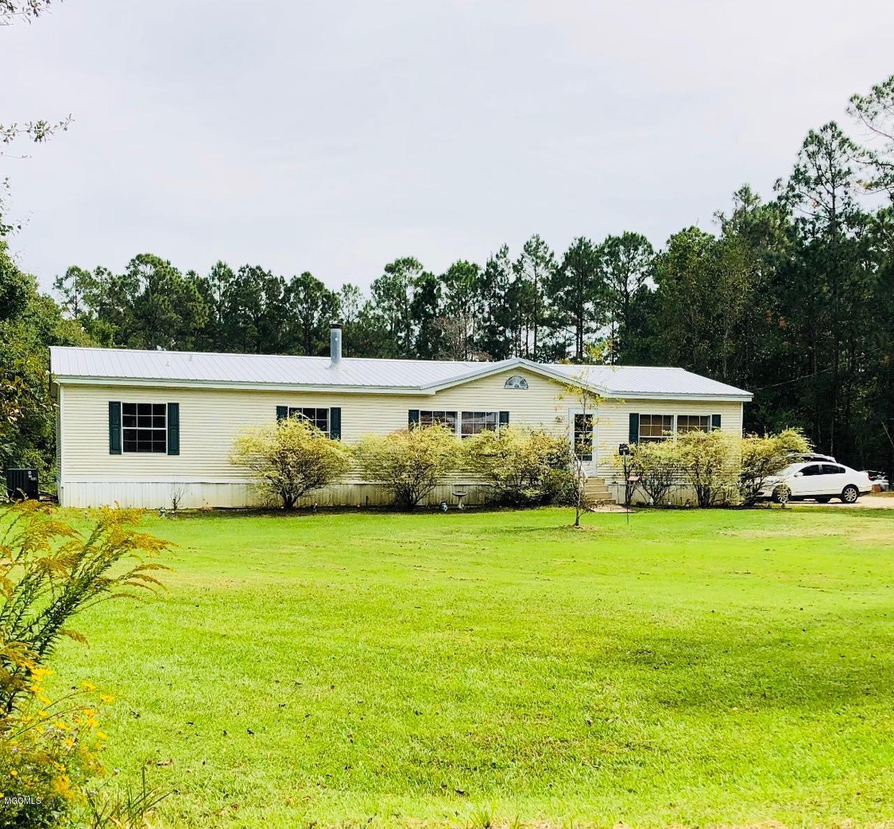 17112 Camellia Street Kiln, MS 39556 - Photo 1 of 23 IMG_1024
