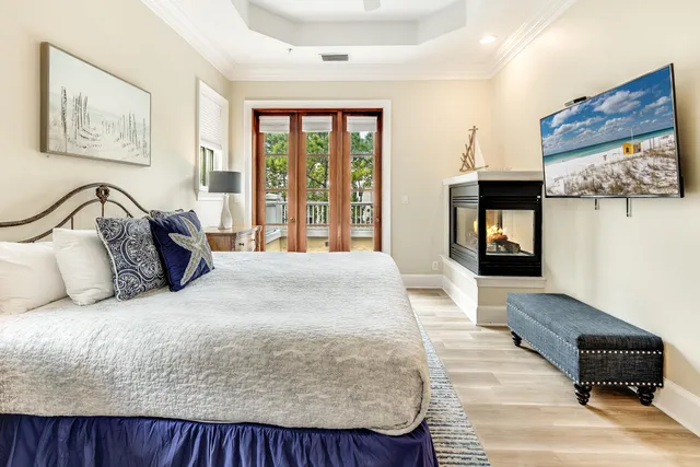a bathroom with a double vanity sink mirror and bathtub