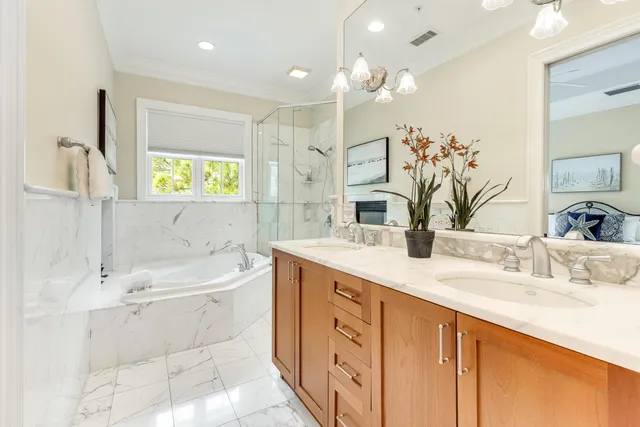a bathroom with a bathtub and a shower