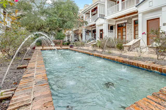 an aerial view of a city with lawn chairs