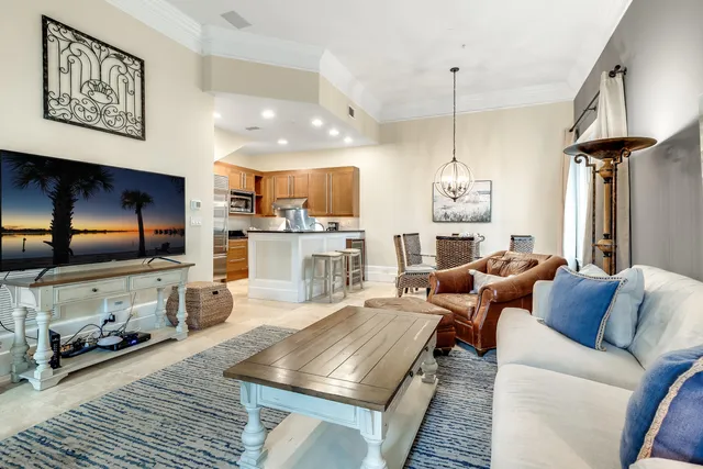 a living room with fireplace furniture and a flat screen tv