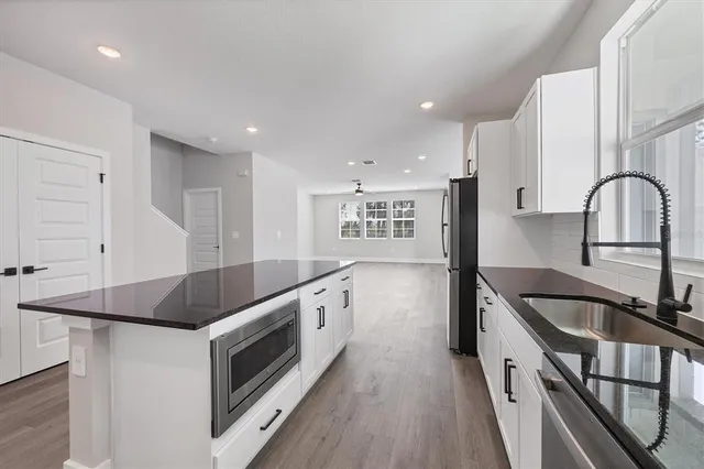 a view of an empty room with a window