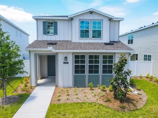 a view of a city with an ocean