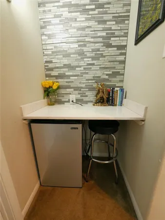 a room with a table and chairs