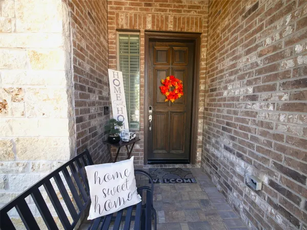 a sign board with a small yard