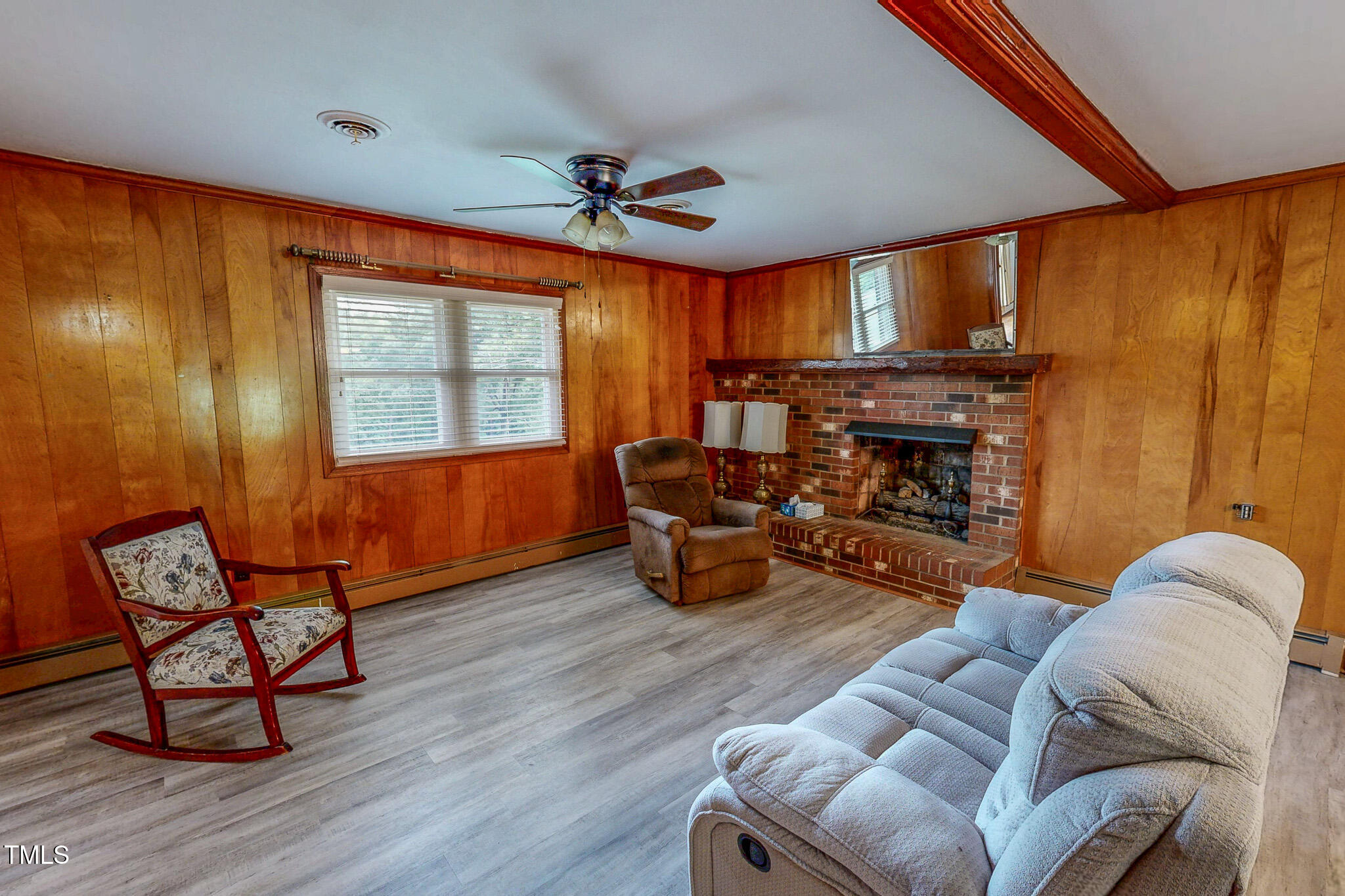 9455 Boston Road Roxboro, NC 27574 - Photo 2 of 42 a living room with furniture a ceiling fan and a window