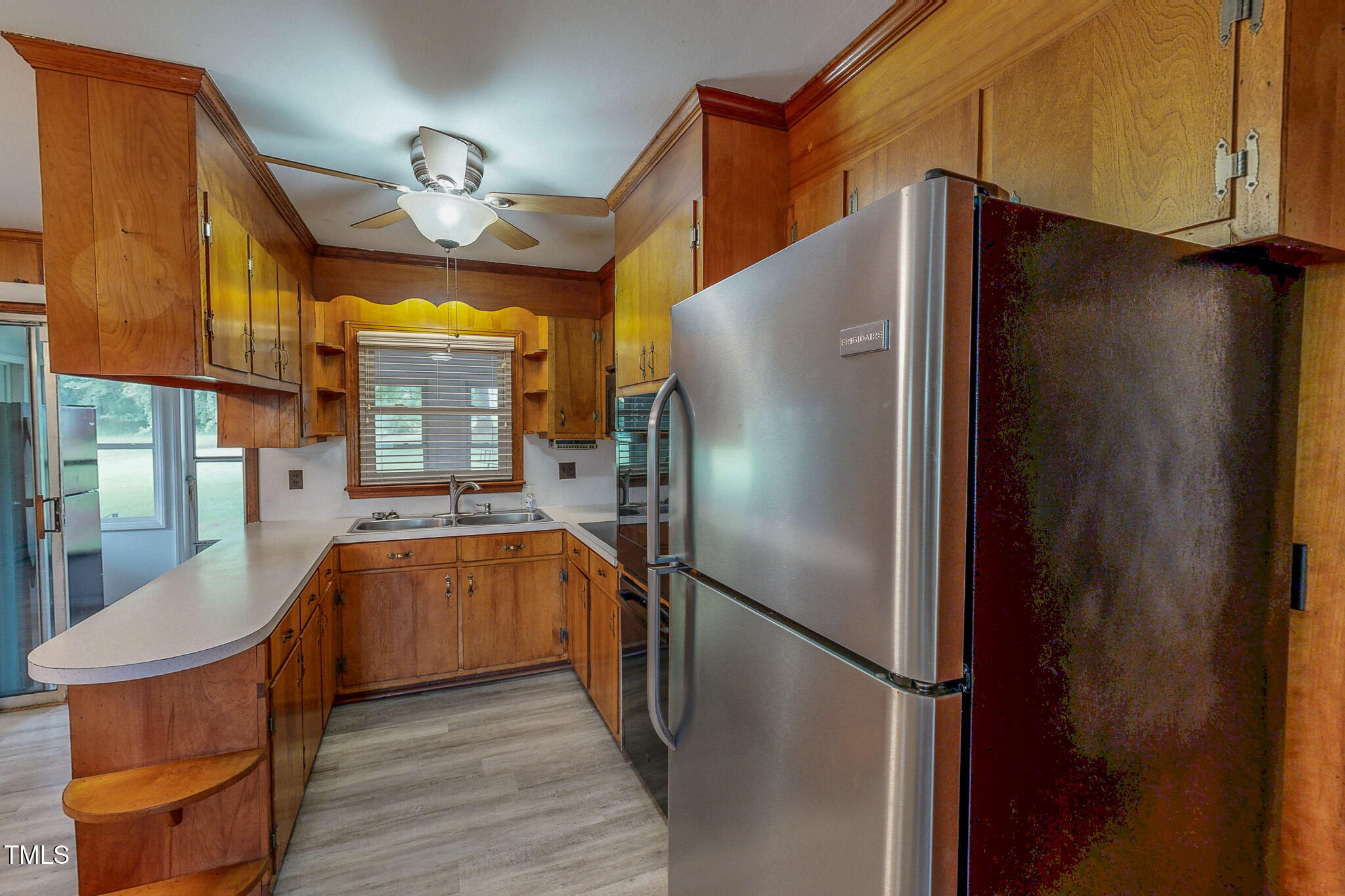 9455 Boston Road Roxboro, NC 27574 - Photo 24 of 42 a kitchen with stainless steel appliances granite countertop a refrigerator and a sink