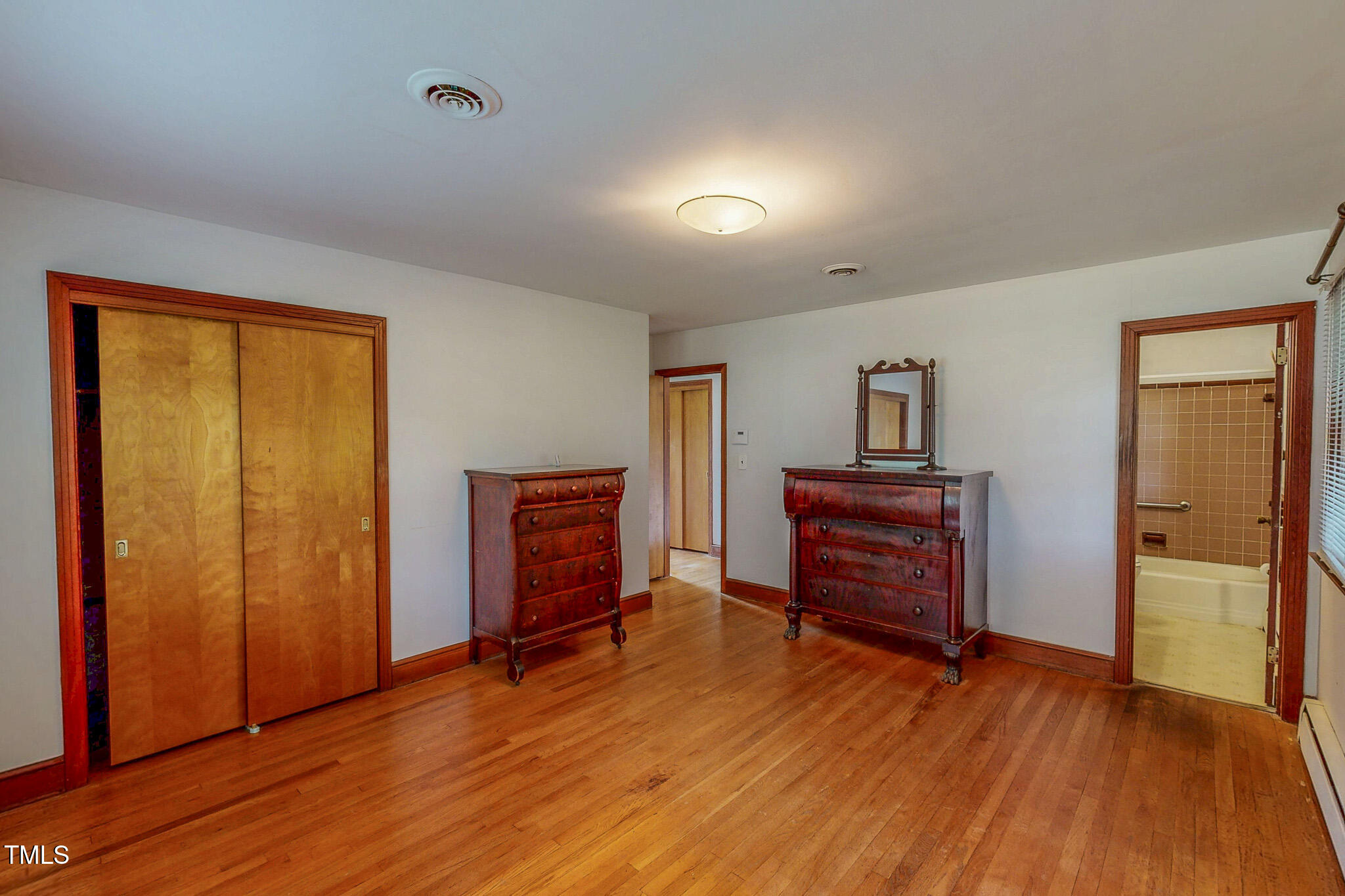 9455 Boston Road Roxboro, NC 27574 - Photo 27 of 42 a view of a livingroom with furniture and wooden floor