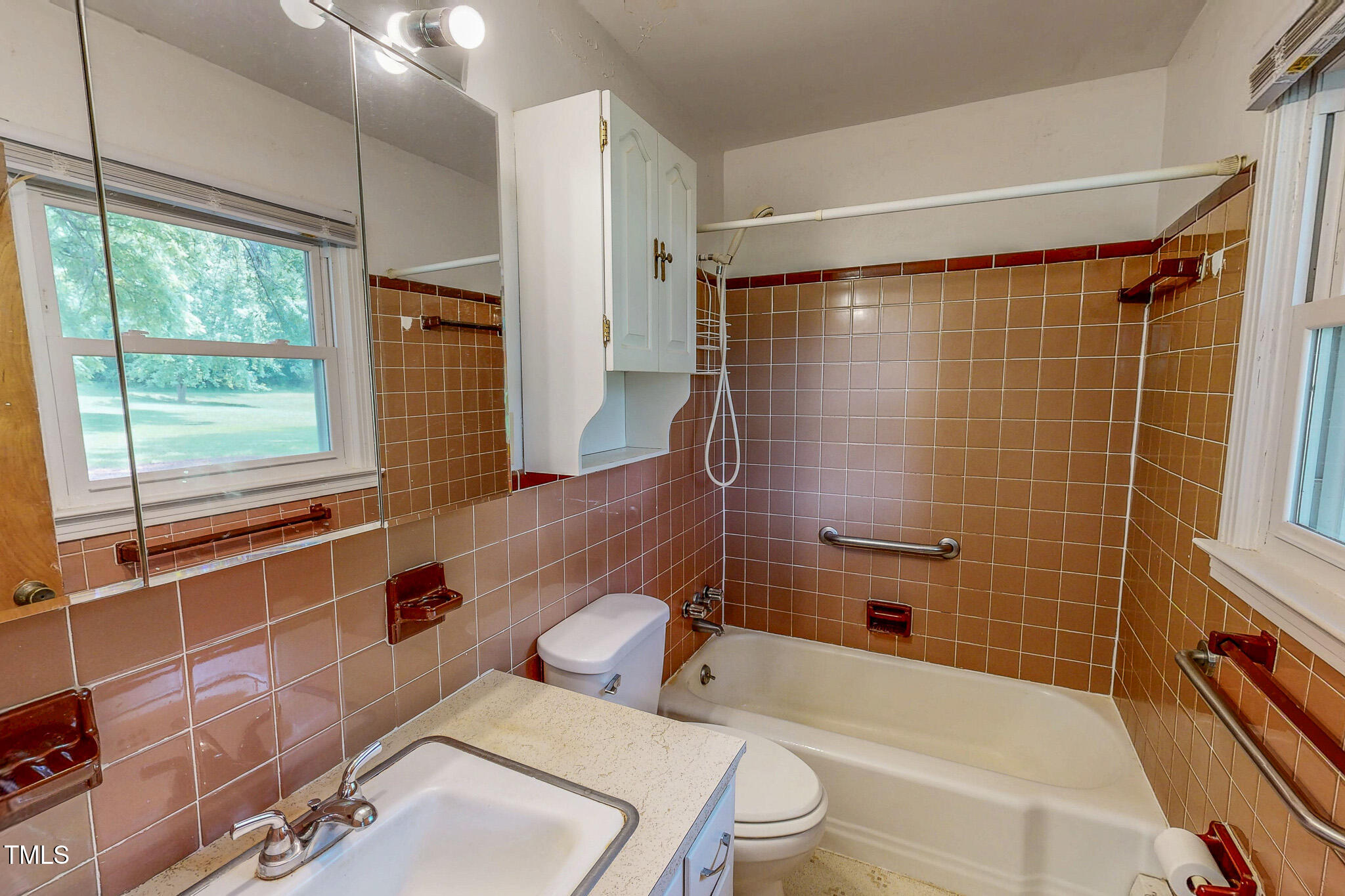 9455 Boston Road Roxboro, NC 27574 - Photo 28 of 42 a bathroom with a sink toilet vanity and shower