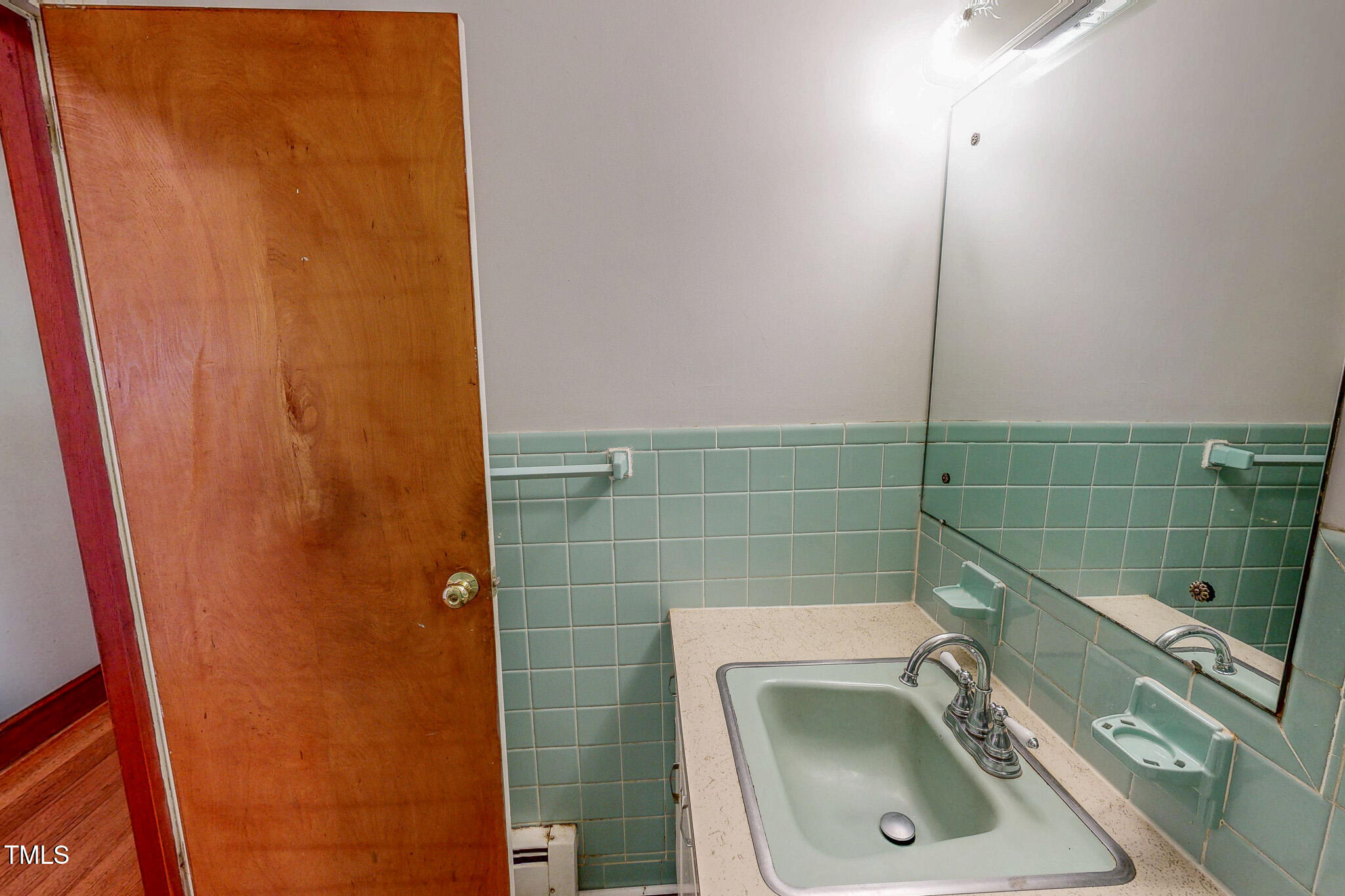 9455 Boston Road Roxboro, NC 27574 - Photo 33 of 42 a bathroom with a sink a toilet and shower