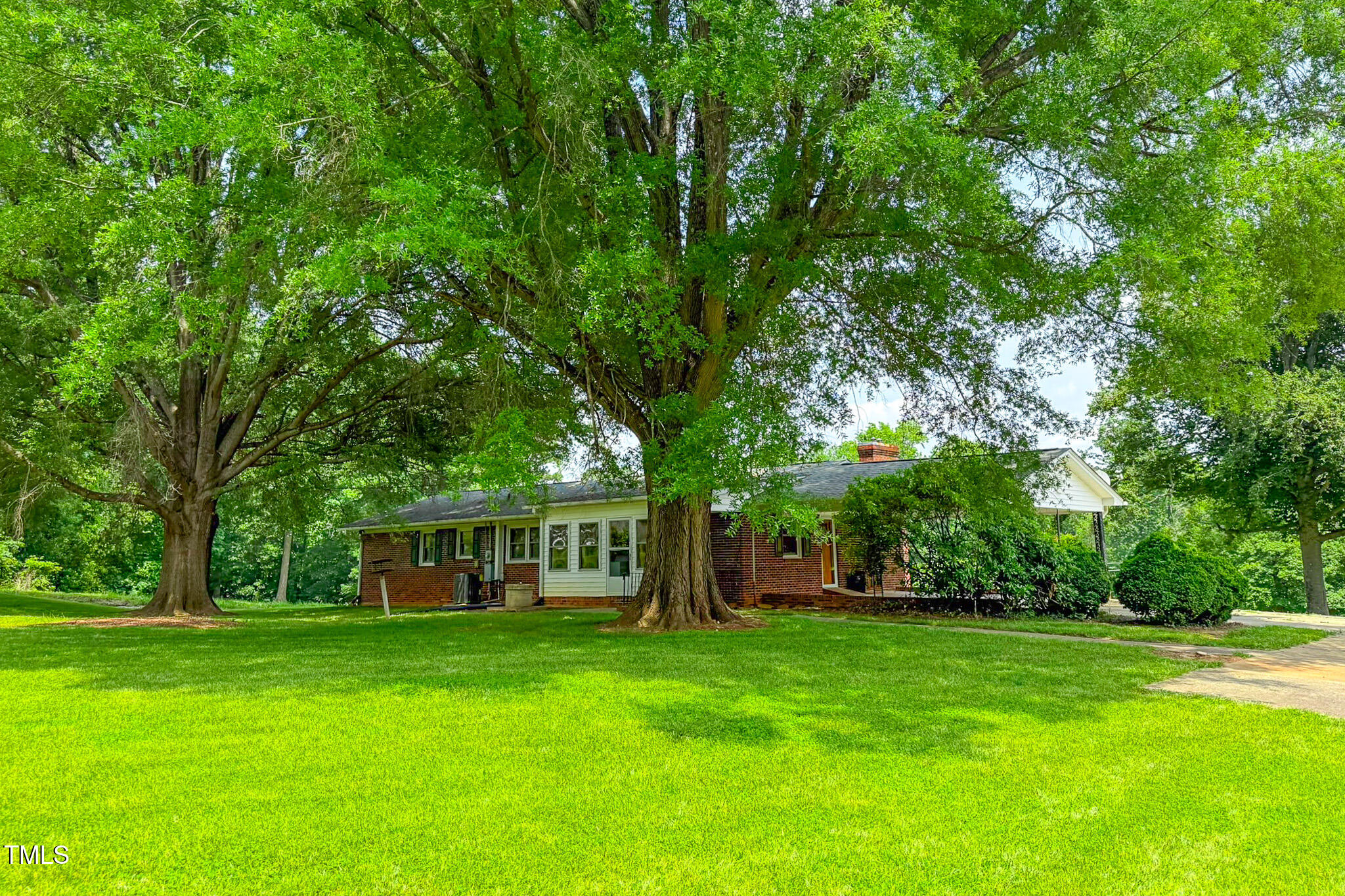 9455 Boston Road Roxboro, NC 27574 - Photo 6 of 42 a view of a house with a yard