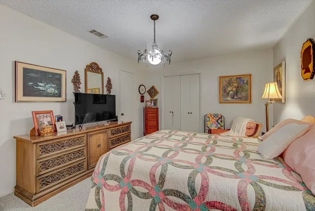 a en suite bathroom with a sink and a mirror