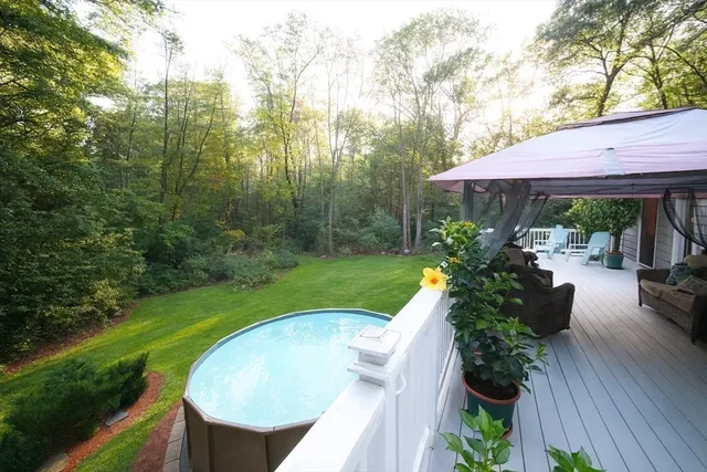 a view of a swimming pool with a patio