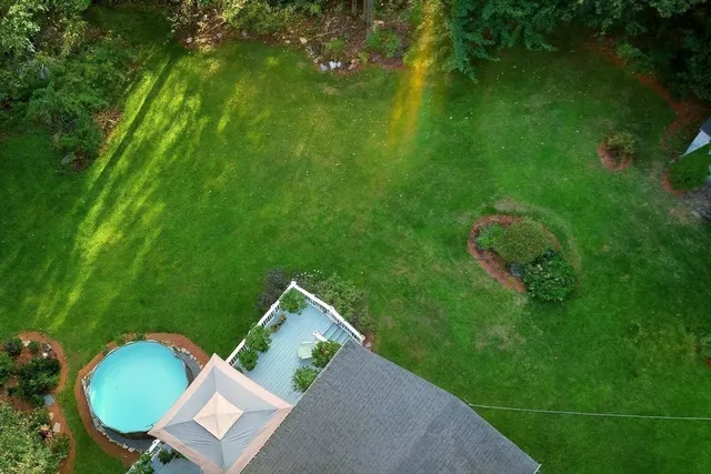 a view of a house with backyard