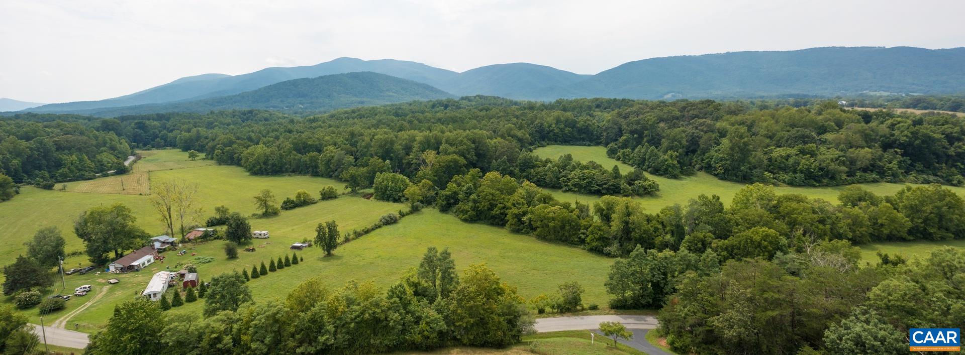 Mountain Road Afton, VA 22920 - Photo 11 of 27 a view of a lush green hillside and houses
