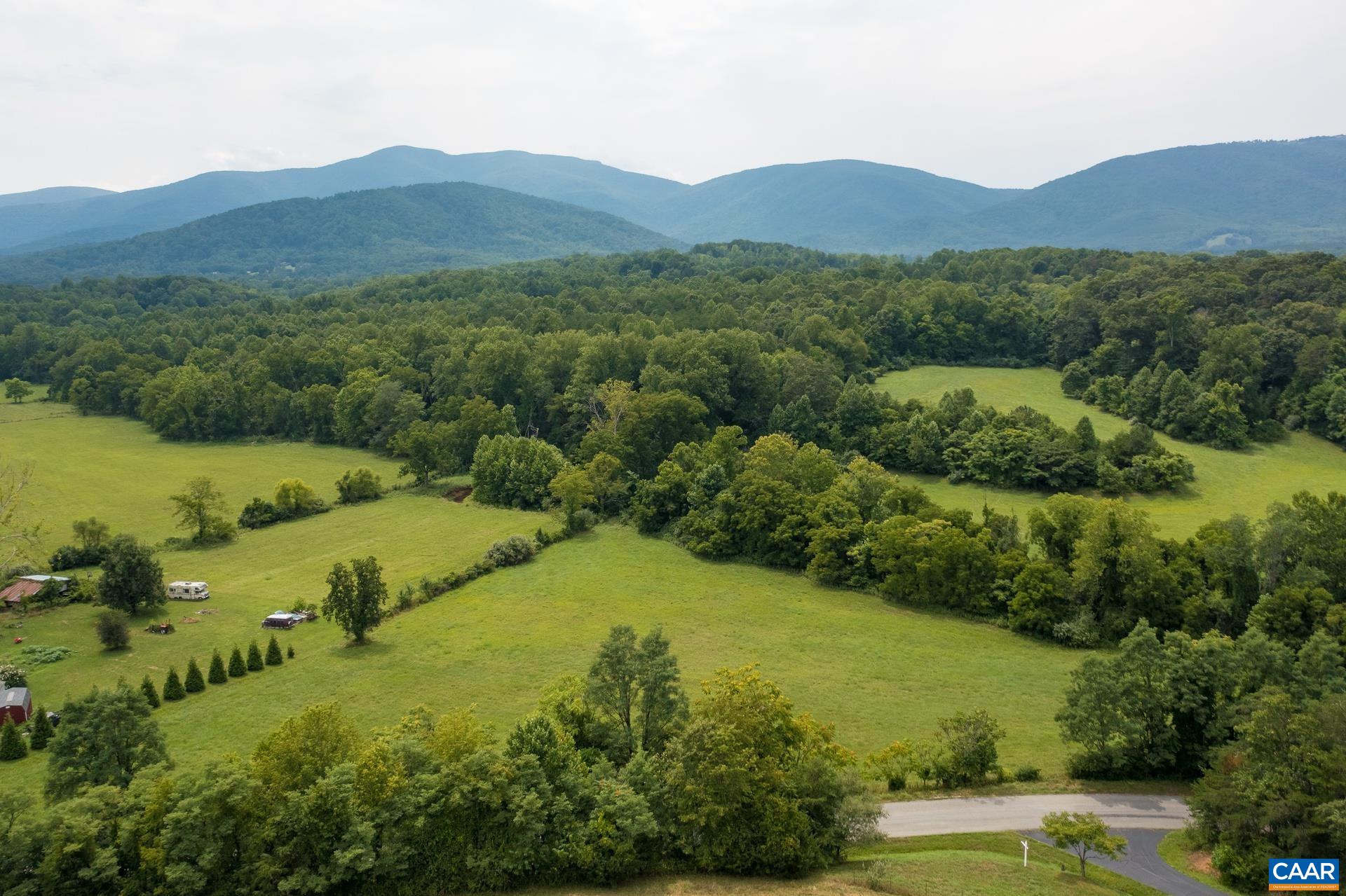 Mountain Road Afton, VA 22920 - Photo 4 of 27 a view of a lush green hillside and houses