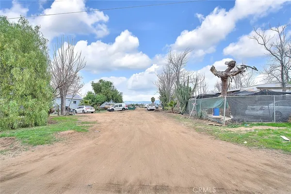 a view of a backyard of a house