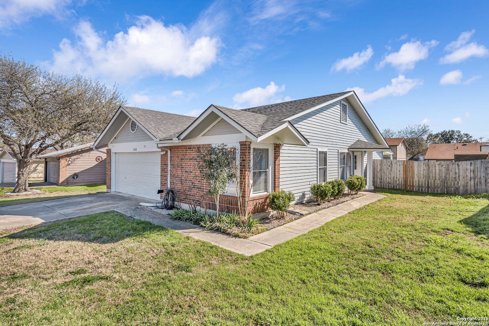 8722 Ridge Moon Drive San Antonio, TX 78239 - Photo 14 of 19 a view of a house with a yard