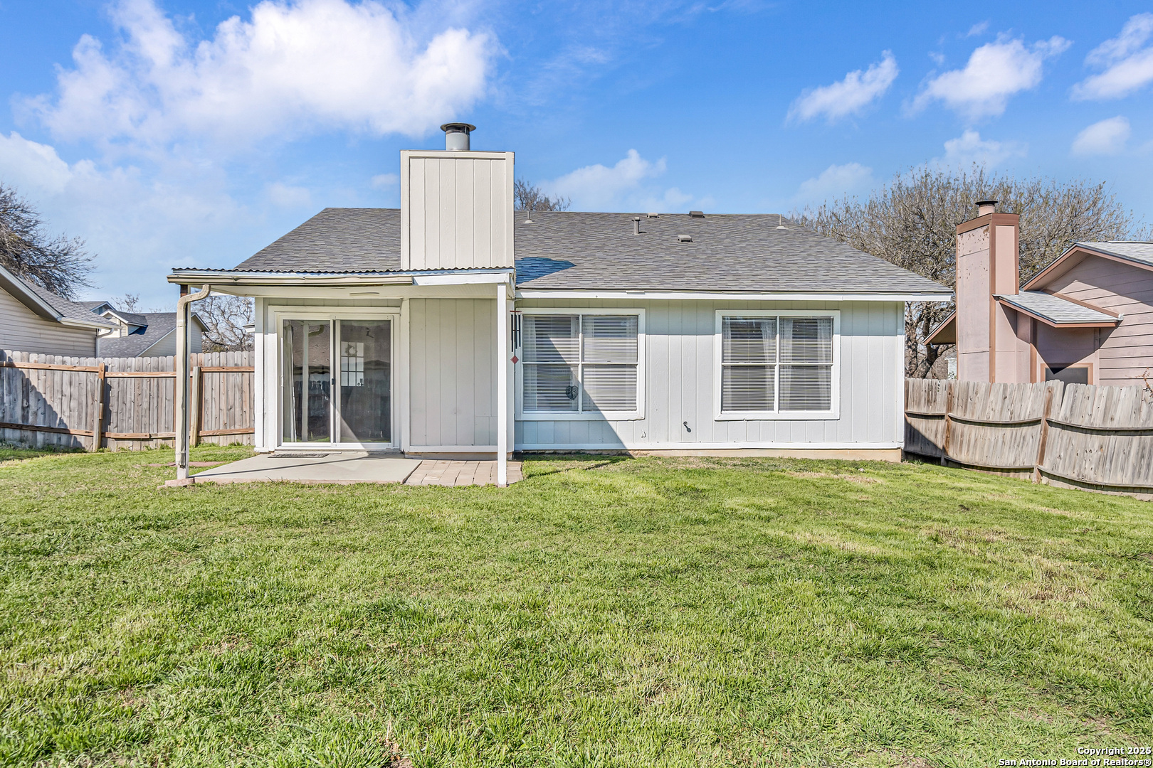 8722 Ridge Moon Drive San Antonio, TX 78239 - Photo 15 of 19 front view of a house with a yard