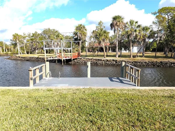 a view of a swimming pool with a lake view