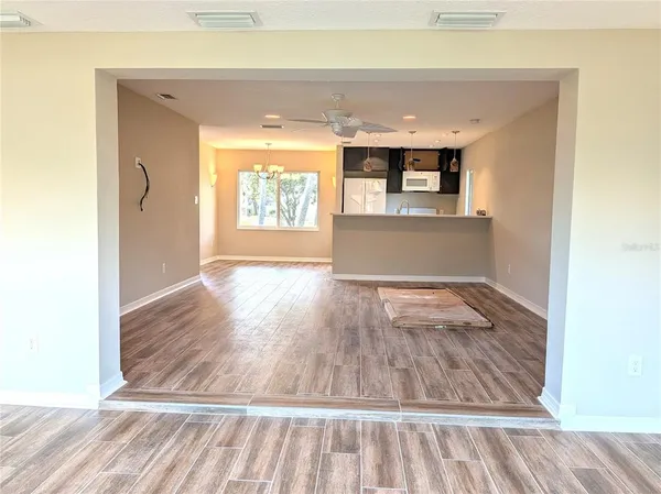 a view of an empty room and window