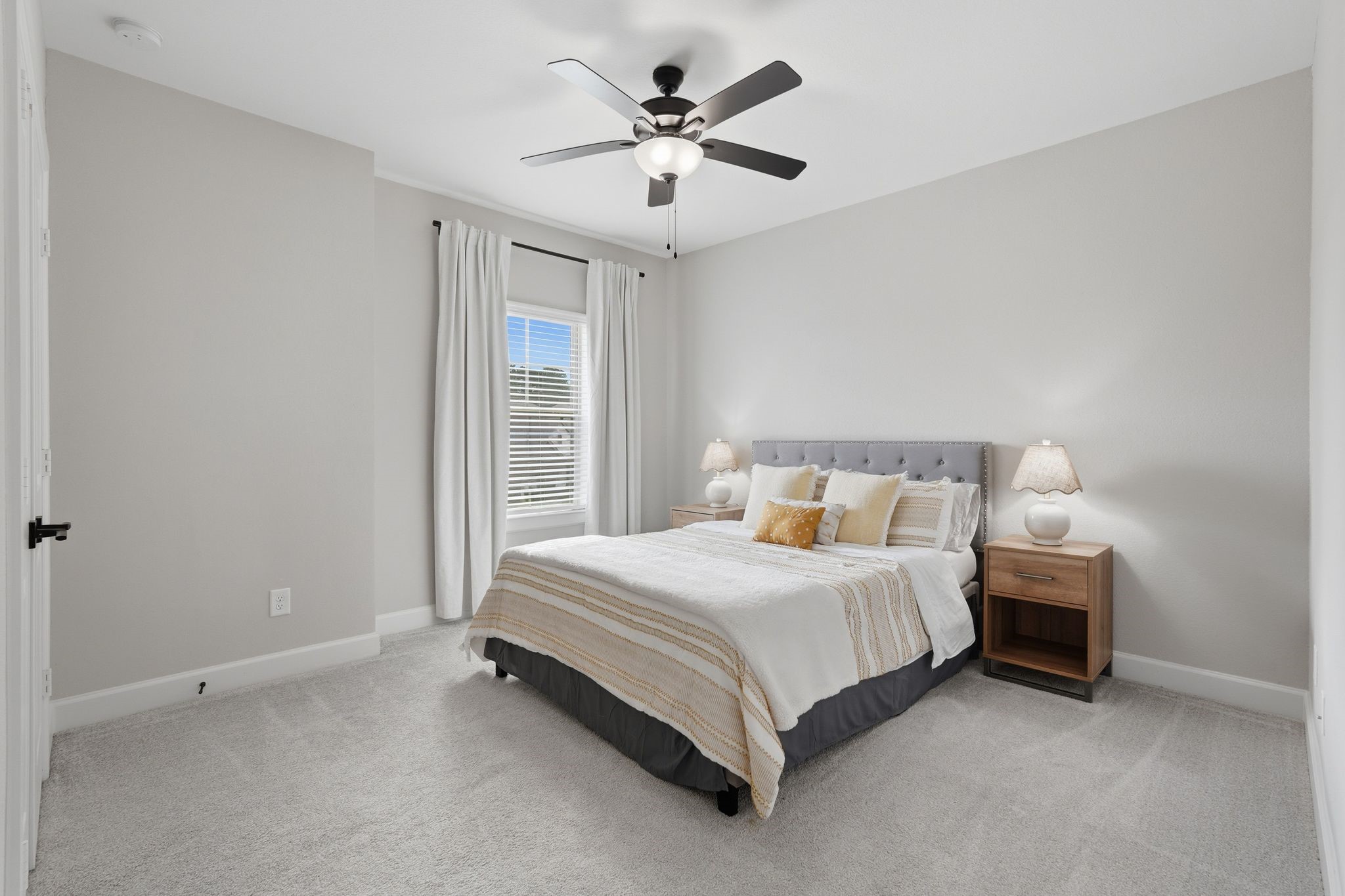 24423 Morningside Terrace Tomball, TX 77375 - Photo 19 of 47 a bedroom with a bed and a ceiling fan