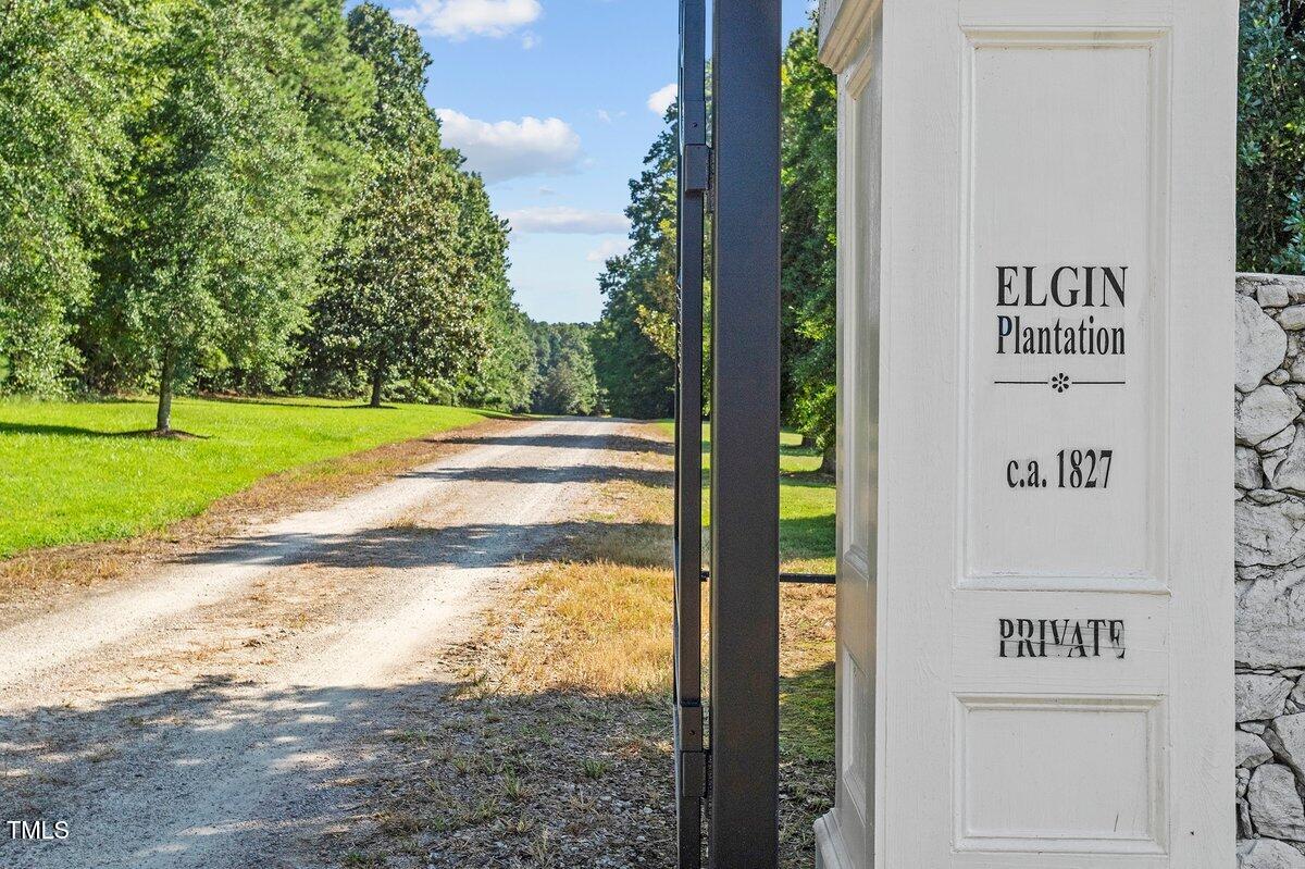 206 Shaver Road Macon, NC 27551 - Photo 4 of 68 a view of a park that has sign board