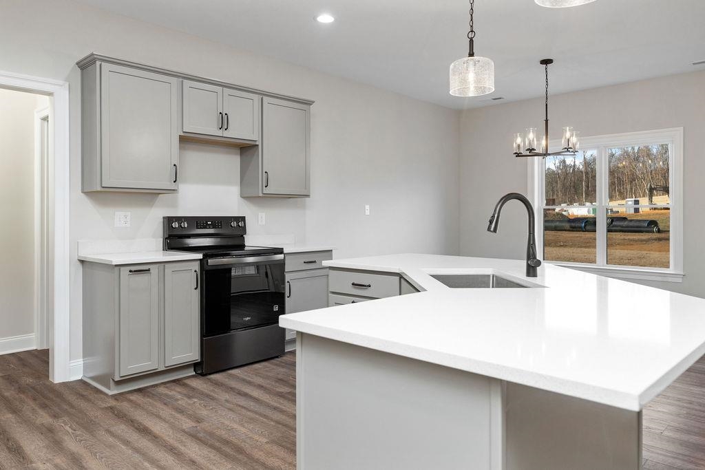Tba Lindburgh Drive Waynesboro, VA 22980 - Photo 12 of 42 a kitchen with a sink a stove and chairs