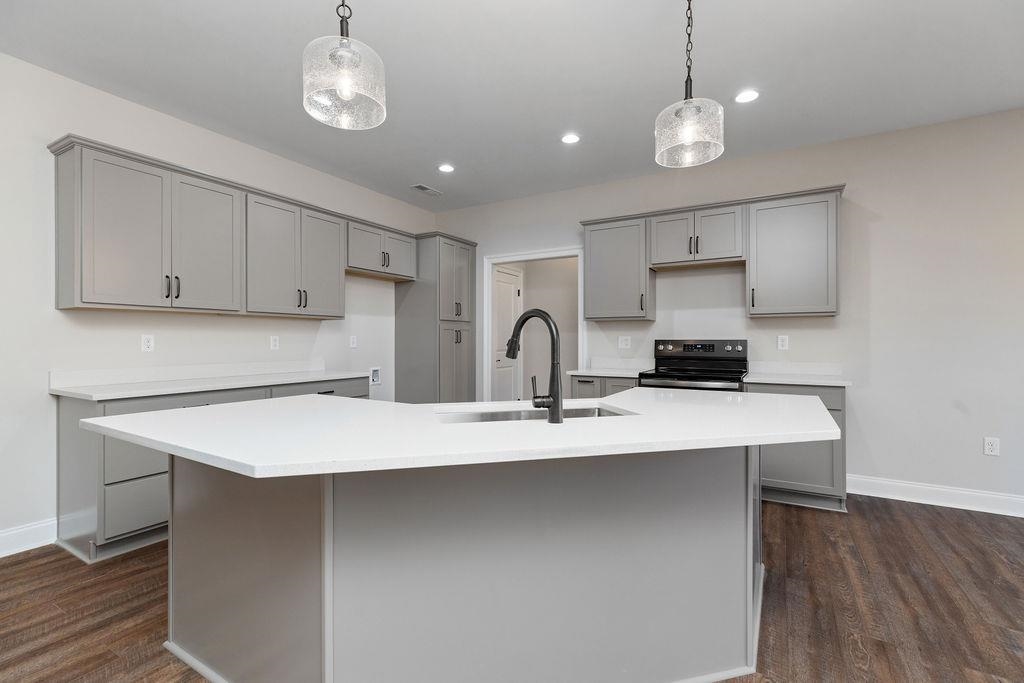 Tba Lindburgh Drive Waynesboro, VA 22980 - Photo 16 of 42 a kitchen with kitchen island stainless steel appliances a sink cabinets and wooden floor