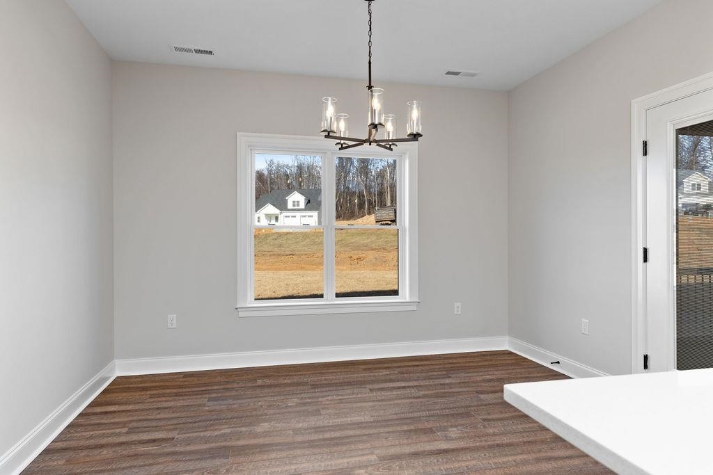 Tba Lindburgh Drive Waynesboro, VA 22980 - Photo 18 of 42 a view of an empty room with wooden floor and a window