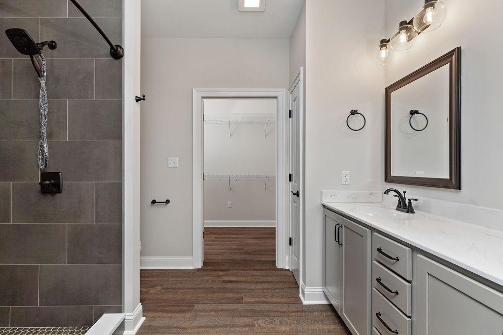 Tba Lindburgh Drive Waynesboro, VA 22980 - Photo 27 of 42 a bathroom with a double vanity sink a mirror and shower